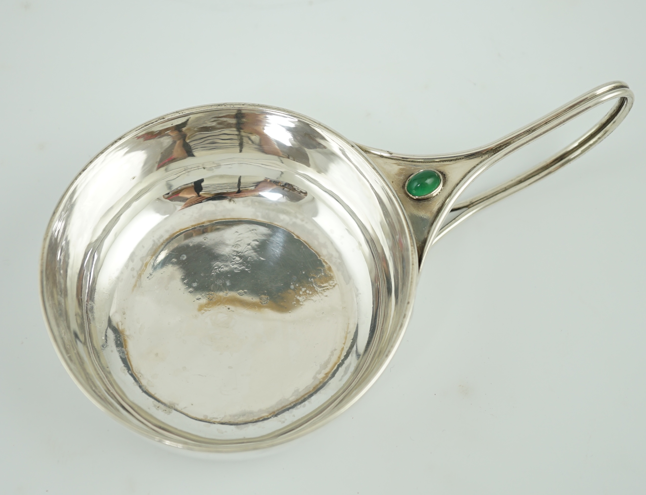 An Edwardian Arts & Crafts Charles Robert Ashbee for the Guild of Handicrafts Ltd silver and single stone cabochon chrysoprase set porringer